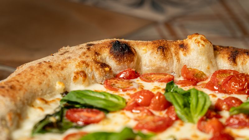Jet's Classic Margherita pizza with fresh basil and mozzarella